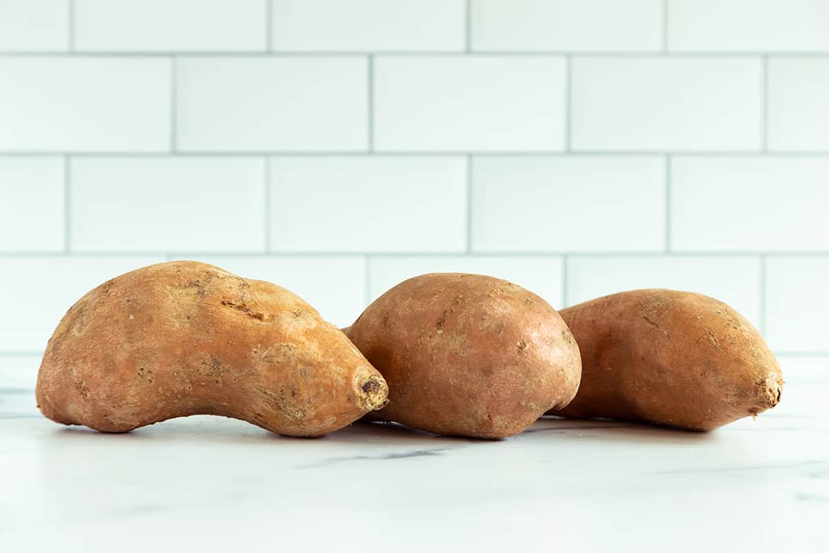 sweet potatoes on countertop.
