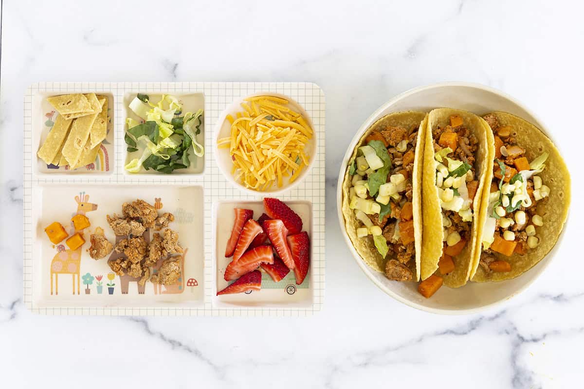 Ground turkey tacos served with toppings.