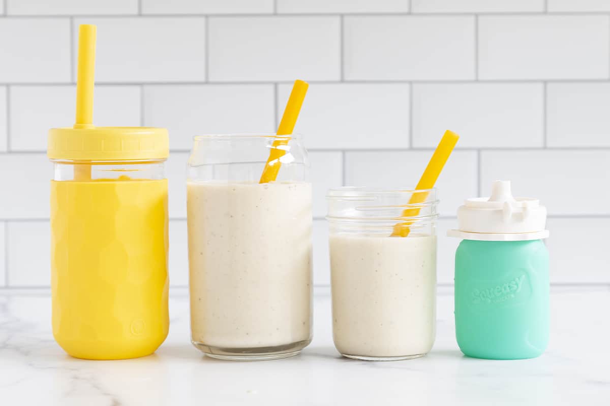 Banana smoothie in various containers.