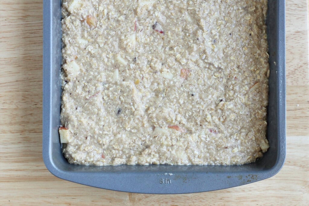 baked apple oatmeal batter in pan.