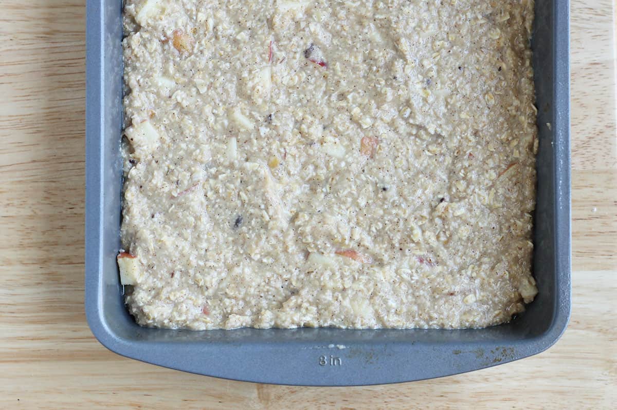 baked apple oatmeal batter in pan.