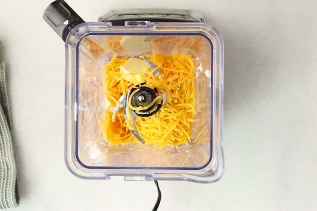 Ingredients for butternut squash mac and cheese sauce in blender.