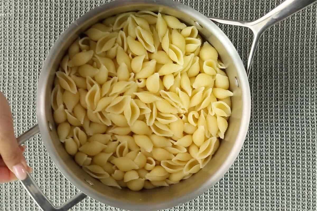 Noodles in pot for butternut squash mac and cheese.