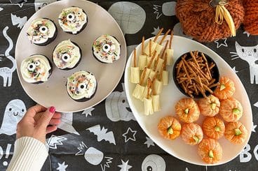 halloween snacks and treats on table.