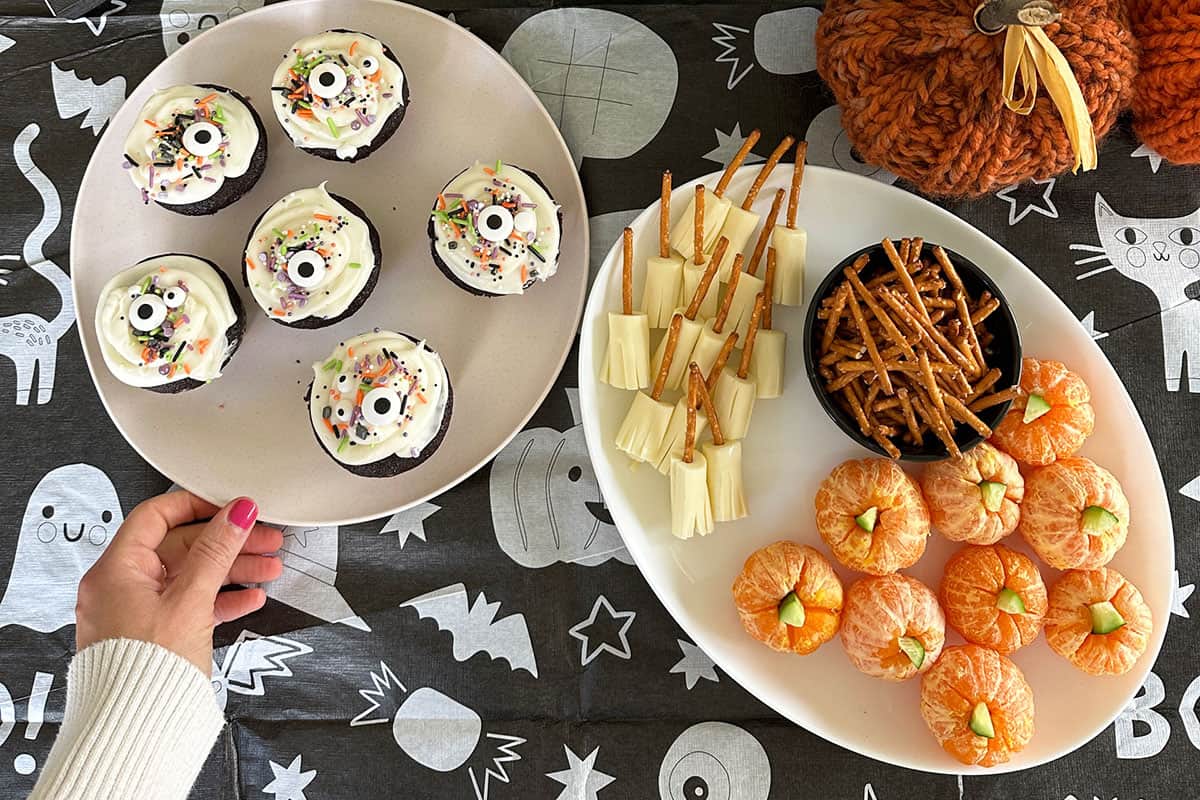 halloween snacks and treats on table.