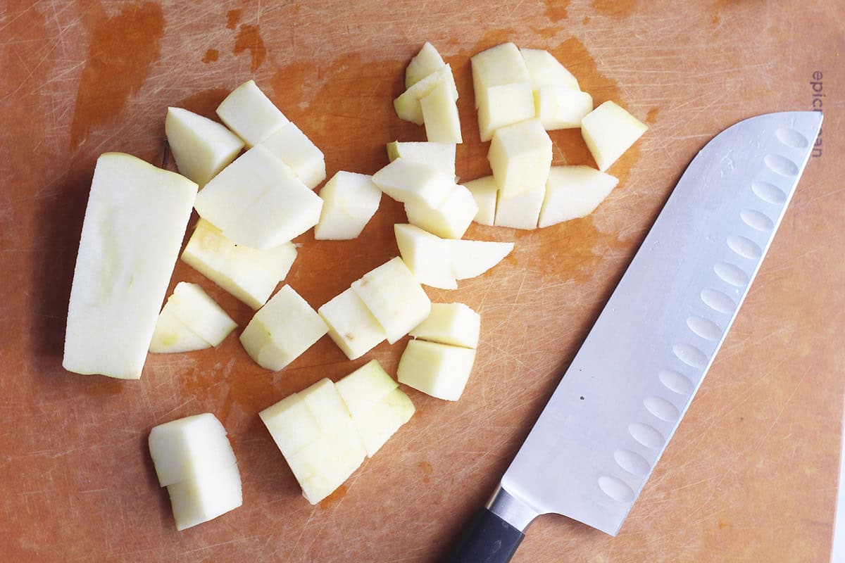 dicing apples on cutting board.