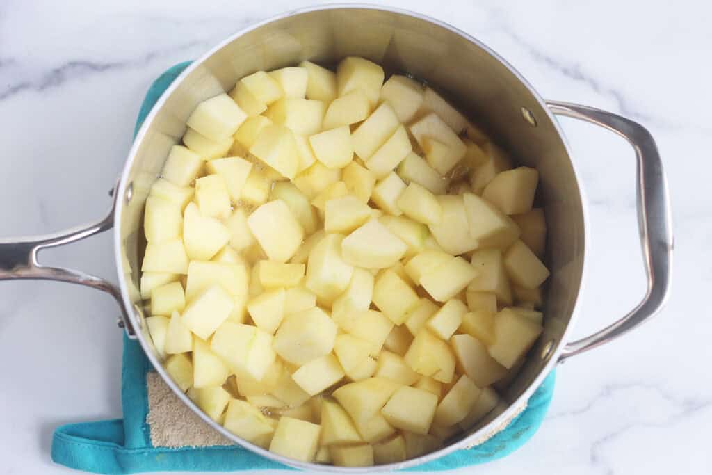 stewed apples in pot.