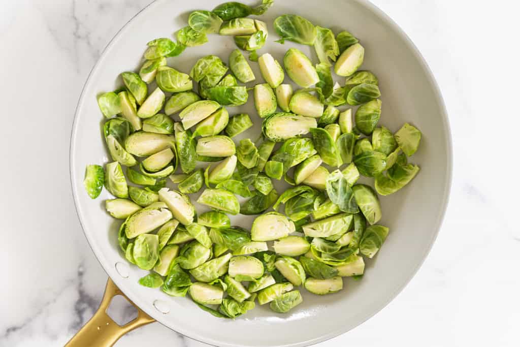 Brussel spout wedges in frying pan for puree.