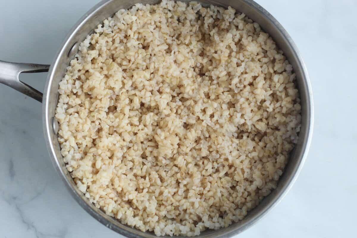 Making baby rice cereal in pot.