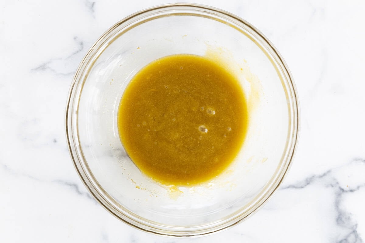 Olive oil in glass bowl for cookies.
