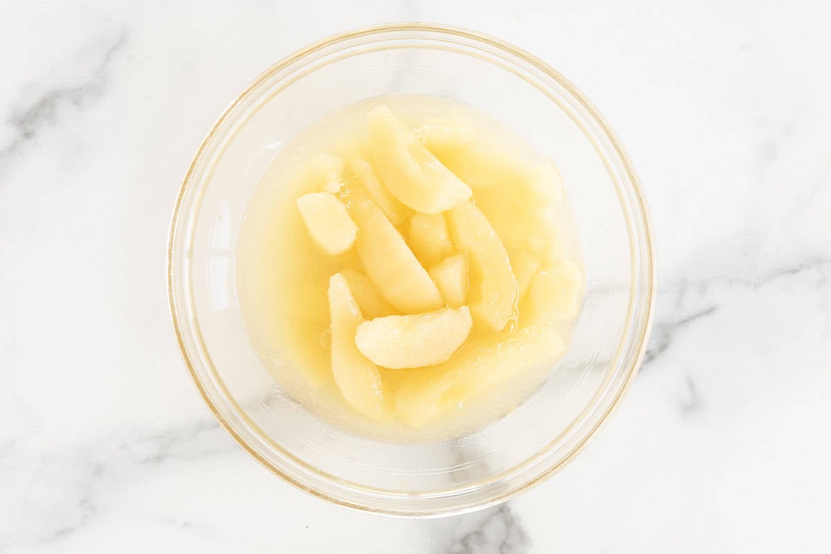 canned pears in glass bowl.