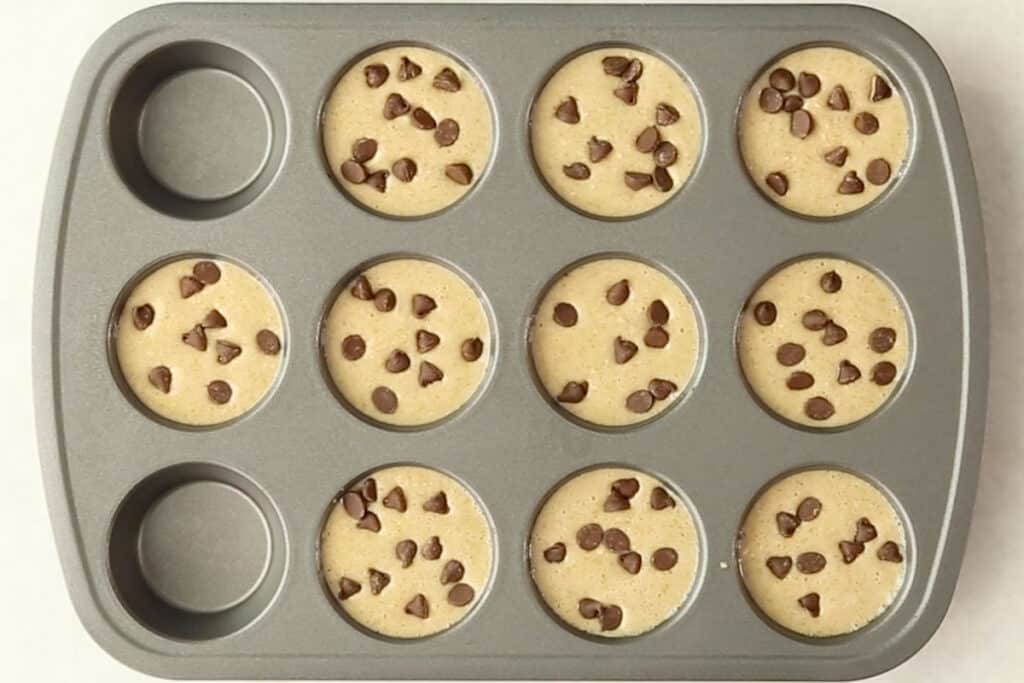 batter for banana oatmeal muffins in pan.