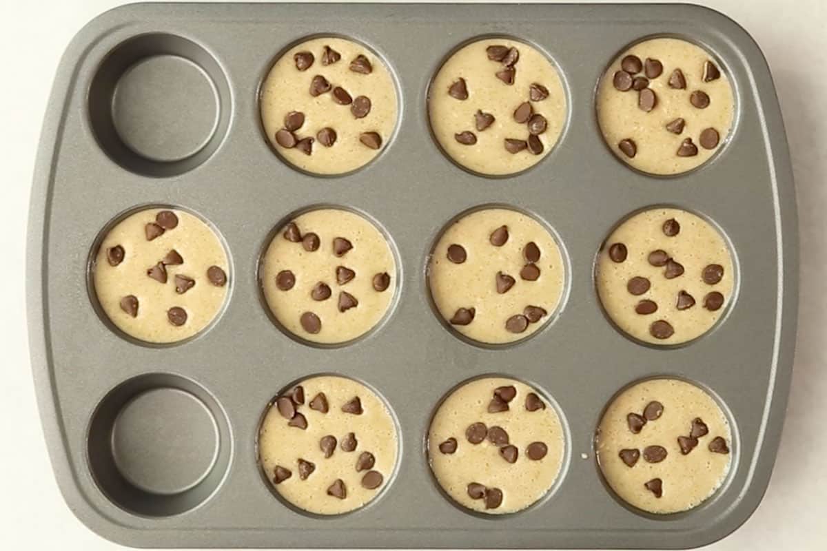 batter for banana oatmeal muffins in pan.