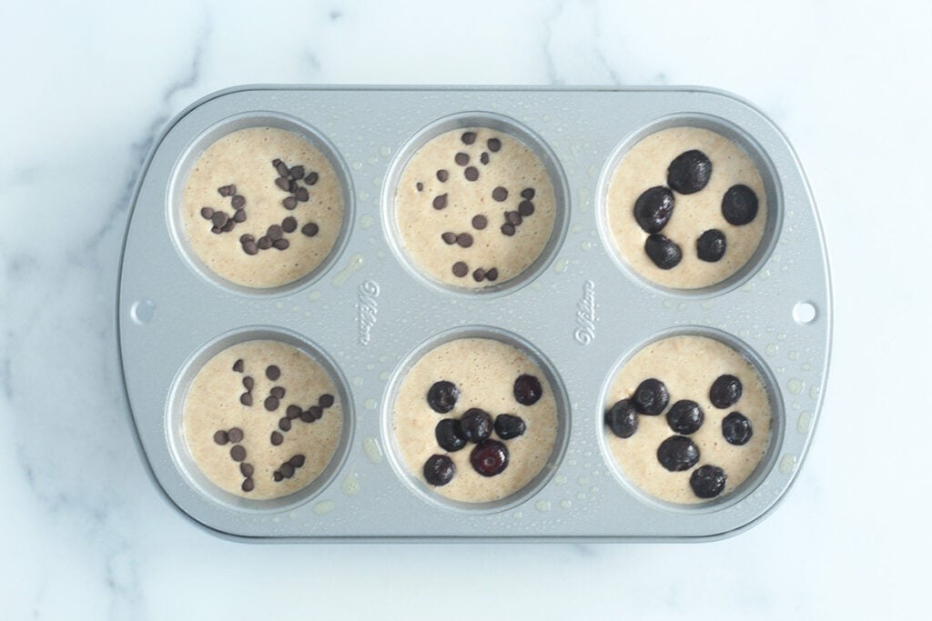 pancake muffin batter in muffin pan.