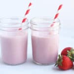 strawberry-milk-in-two-cups-with-straws