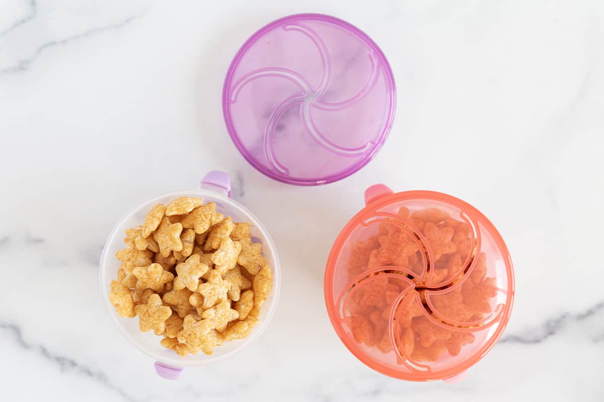 Three toddler snack cups.