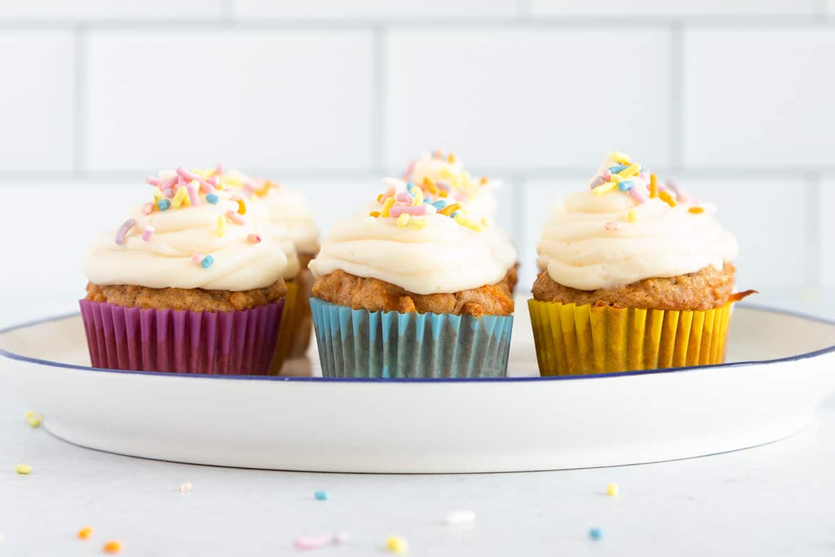carrot cake cupcakes on plate.