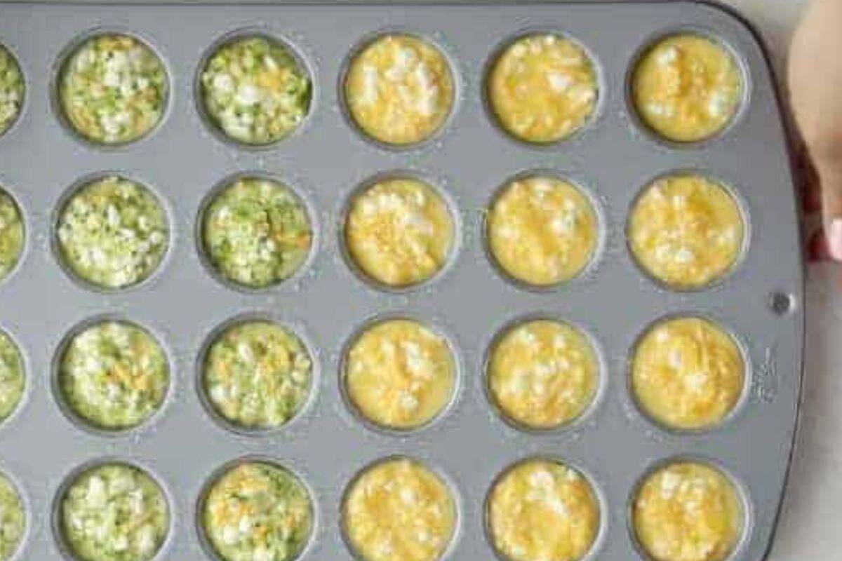 Egg mixture in mini muffin pan for mini egg muffins.