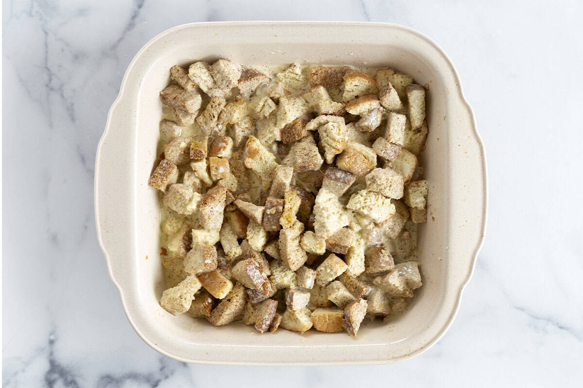 French toast casserole in baking dish before adding fruit on top.