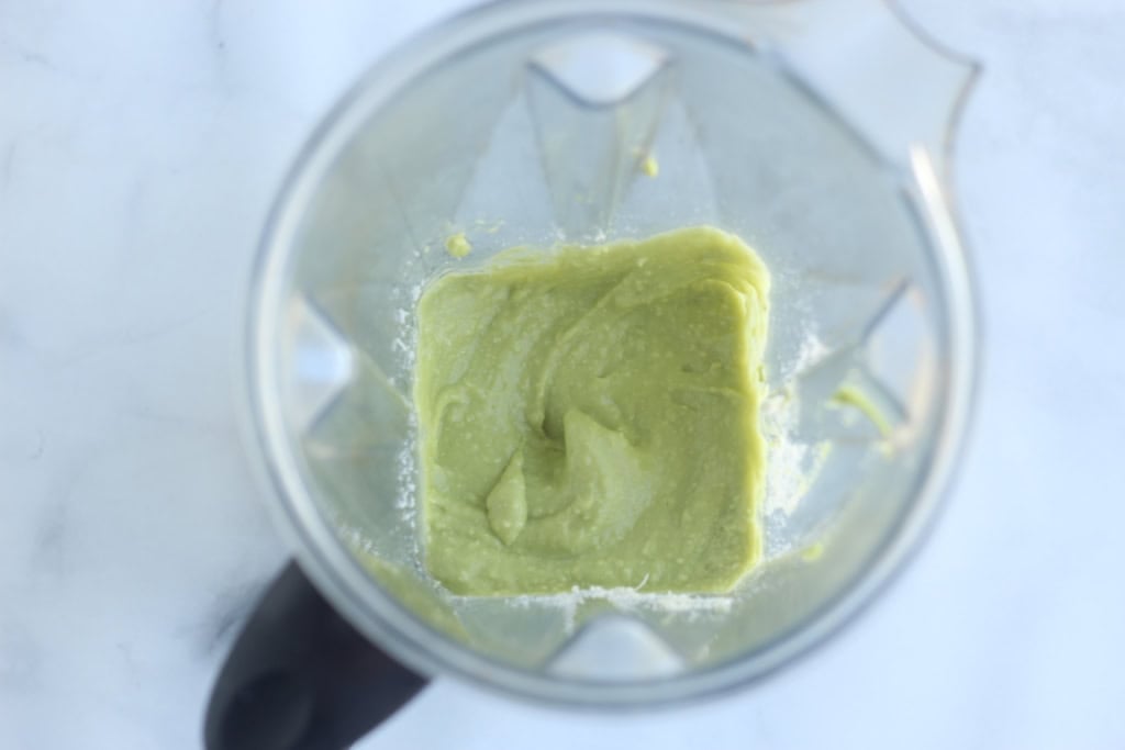 Avocado pasta sauce in blender after blending.