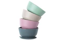 stack of toddler suction bowls on white background.