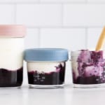 fruit on the bottom blueberry yogurt in small jars.