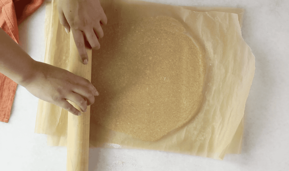 Rolling out the cheese crackers dough. 