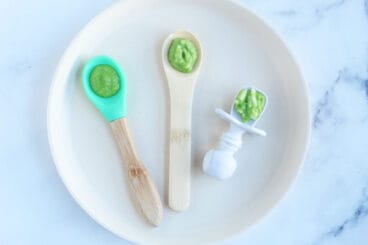 examples of baby food stages on baby spoons.