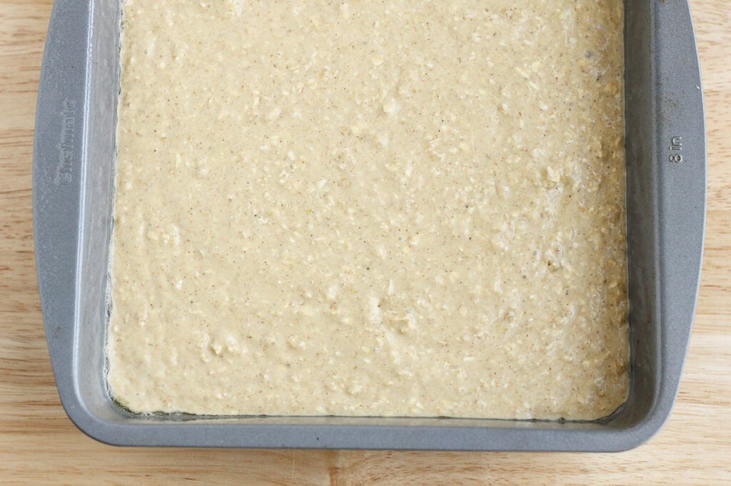 oatmeal banana bread batter in pan.