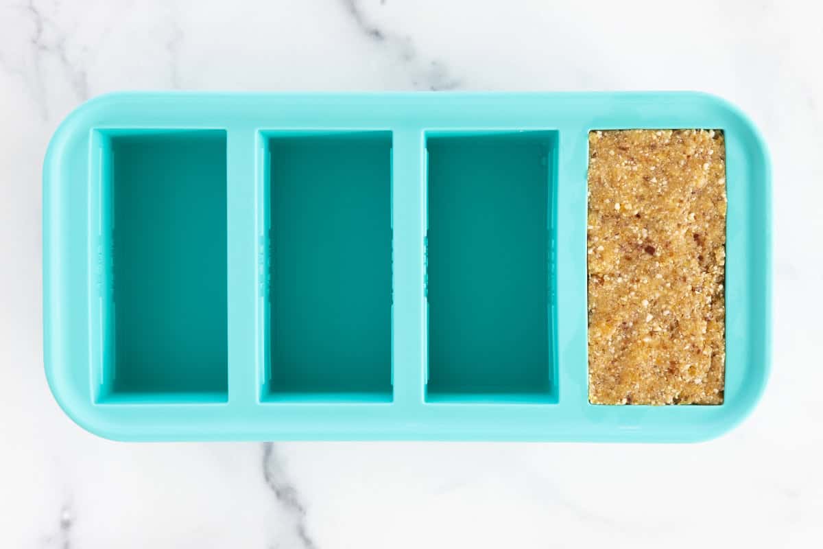 fruit and nut bar mixture in mold.