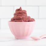 cherry frozen yogurt in pink bowl.