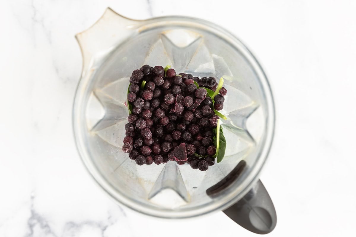 ingredients for blueberry popsicles in blender.