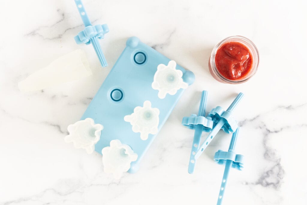 strawberry puree with popsicle molds.
