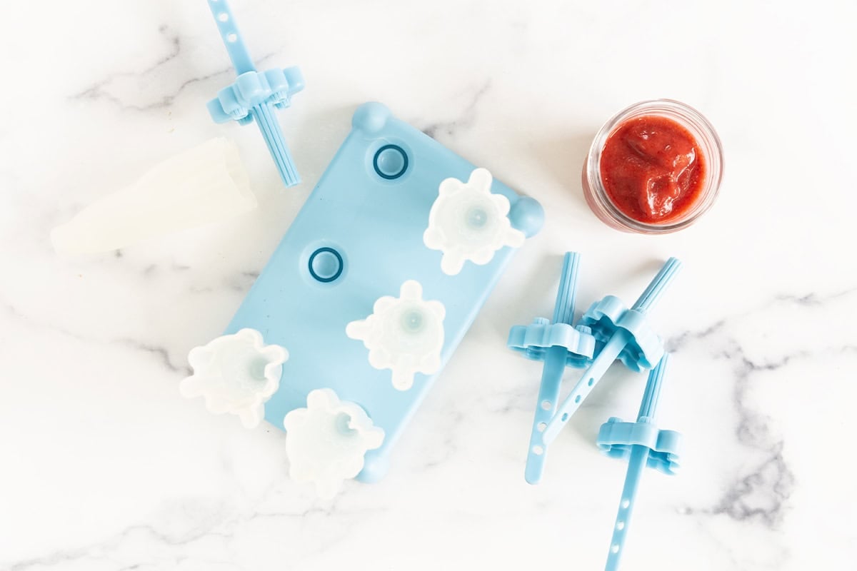 strawberry puree with popsicle molds.