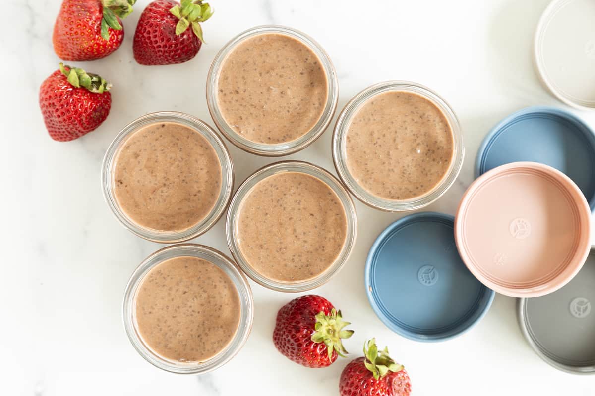 Chocolate chia pudding in glass containers from above. 