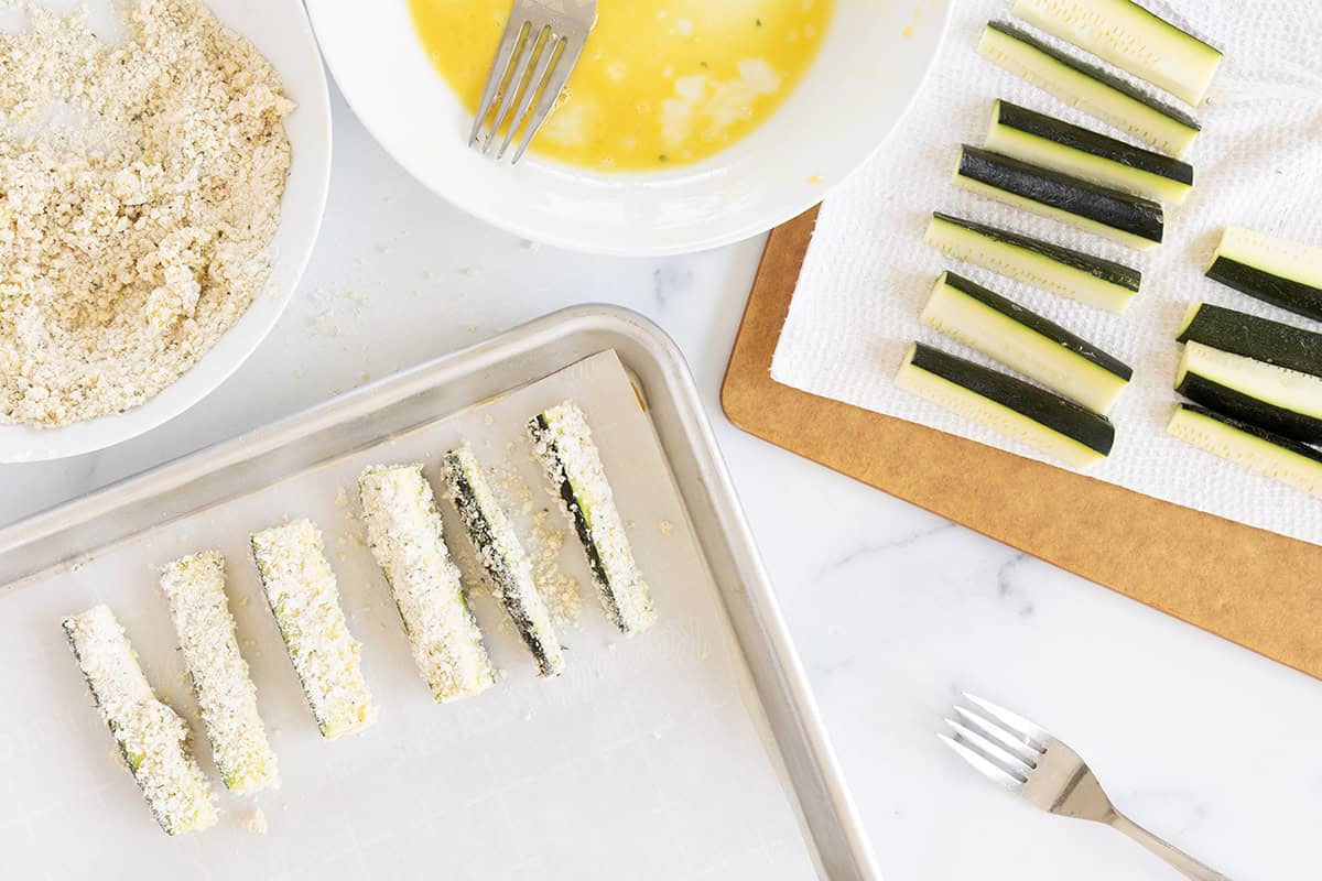 Making zucchini fries.
