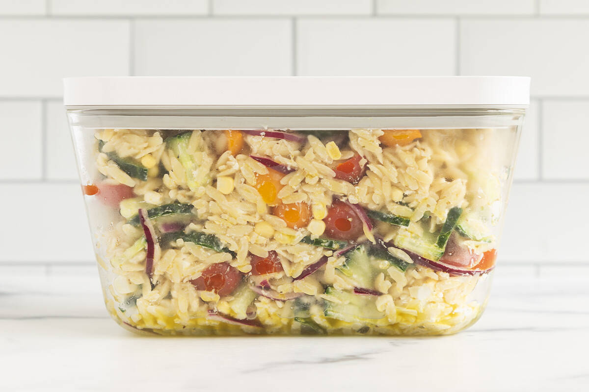 orzo pasta salad in container.