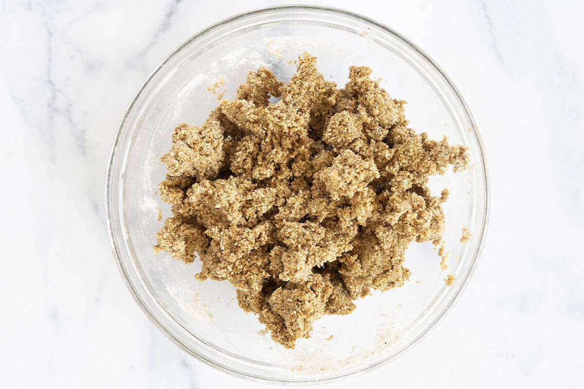Making the crust for fig bars in a glass bowl.
