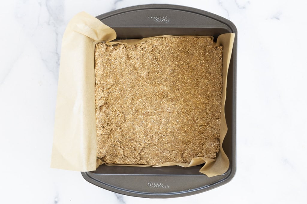 Crust in a pan for fig bars.