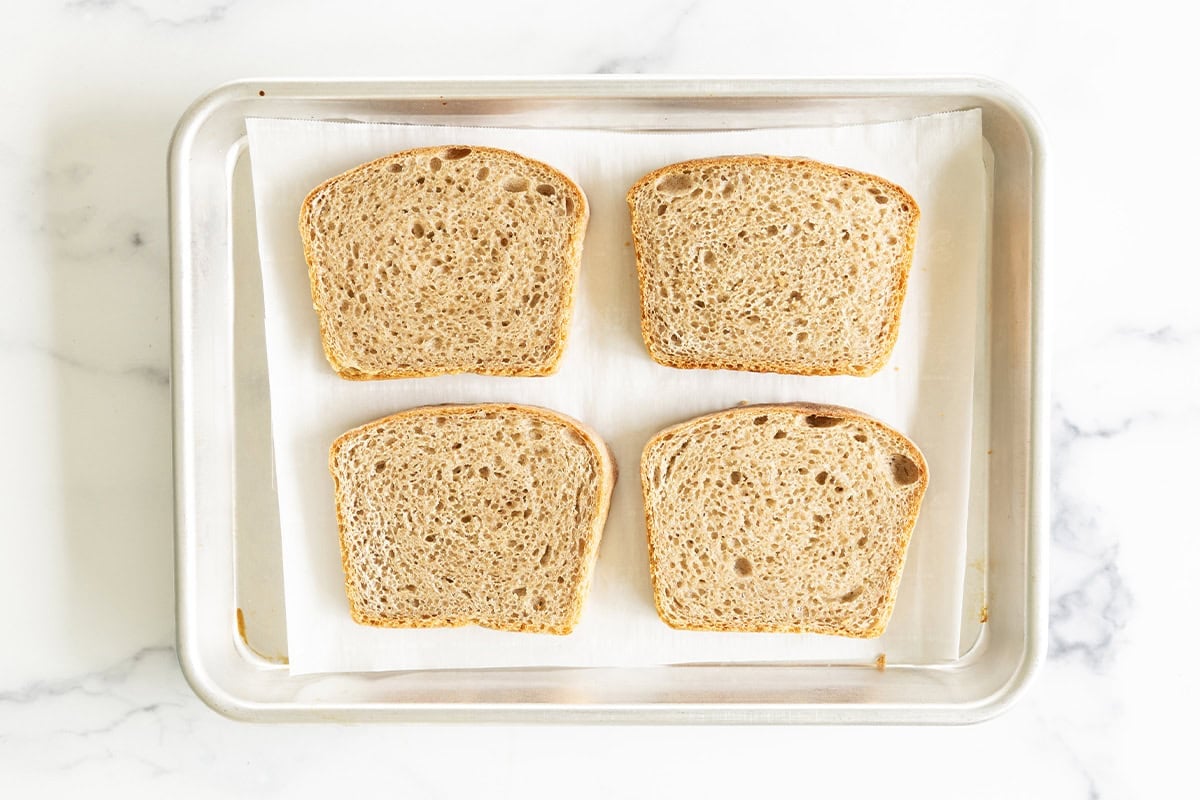 Toast on baking sheet for pizza toast. 