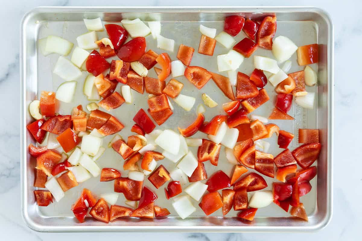 Red pepper pieces on baking sheet for red pepper pasta. 