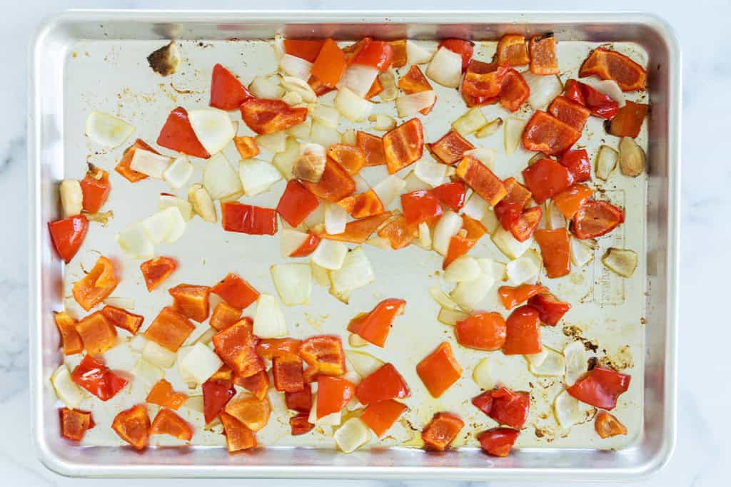 Red peppers on baking sheet for red pepper pasta.