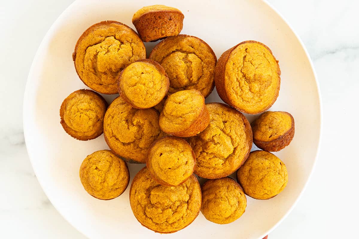 easy pumpkin muffins on pink plate.