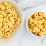 Hidden veggie mac and cheese in two white bowls.