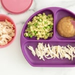 Chicken for baby on purple plate with sides.