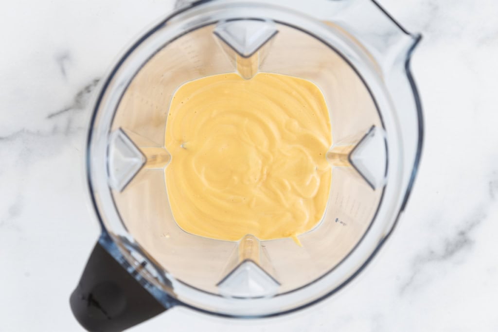 Hidden veggie mac and cheese sauce in blender.