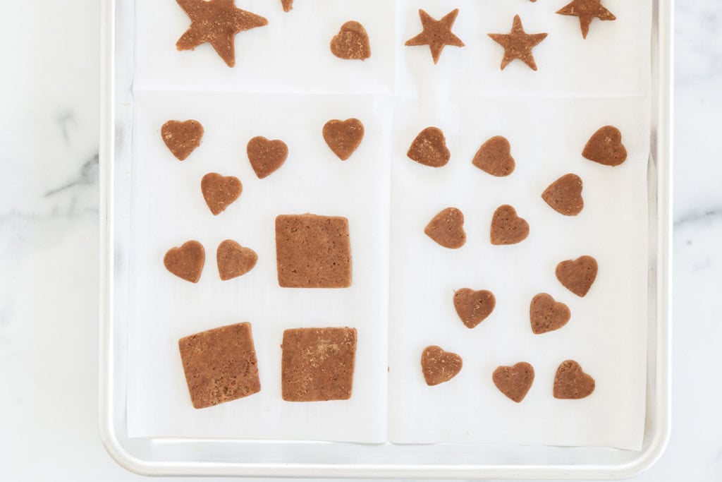 Chocolate sugar cookies on baking sheet.