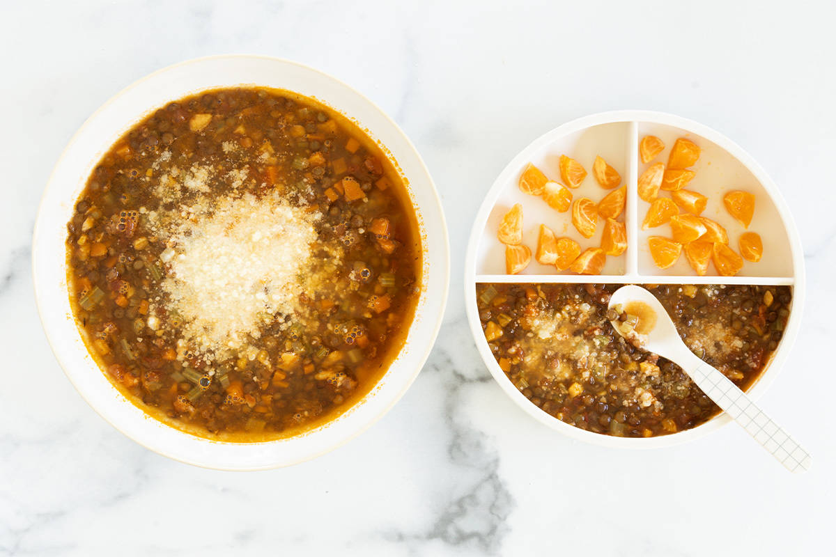 adult and child bowl of lentil soup.