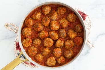 sausage meatballs in pan on counter.
