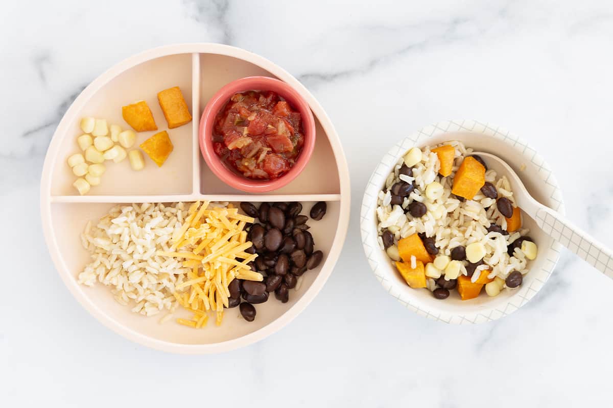 Vegetarian burrito bowls plated in a kids plate and toddler bowl.